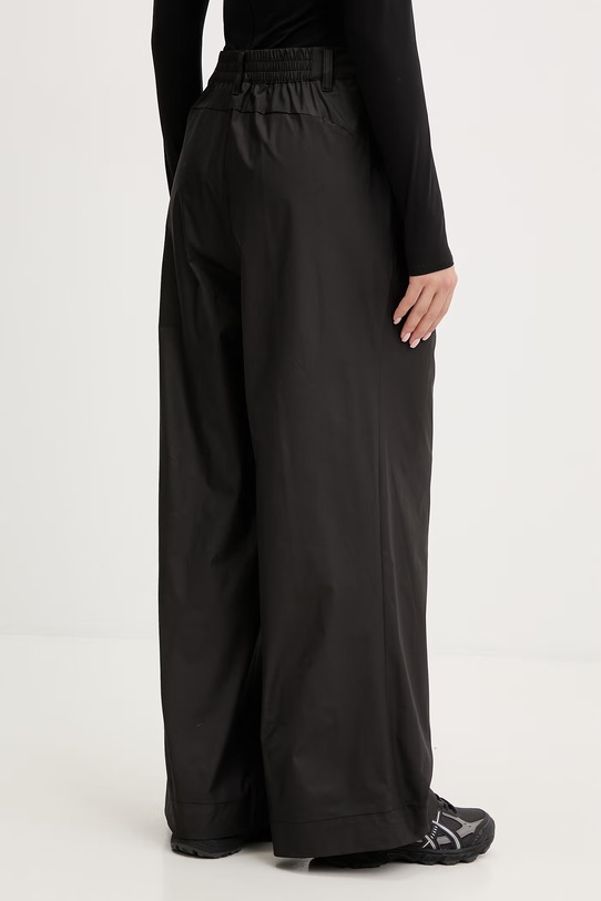 Odzież Puma spodnie damskie Tech Sense 634570 czarny