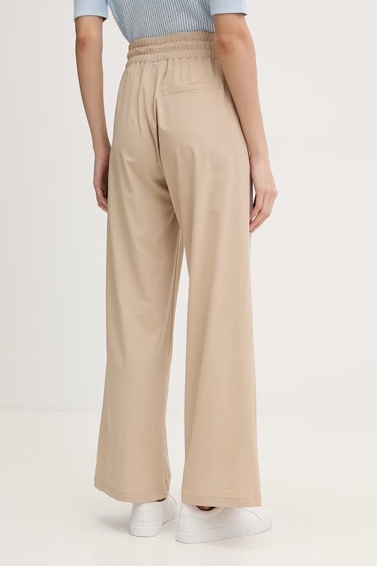 Odzież Helly Hansen spodnie dresowe damskie THALIA 54576 beżowy