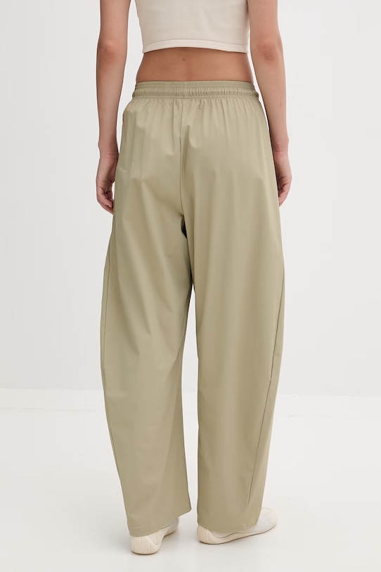 Odzież adidas spodnie joggery damskie x Z.N.E KD8481 zielony