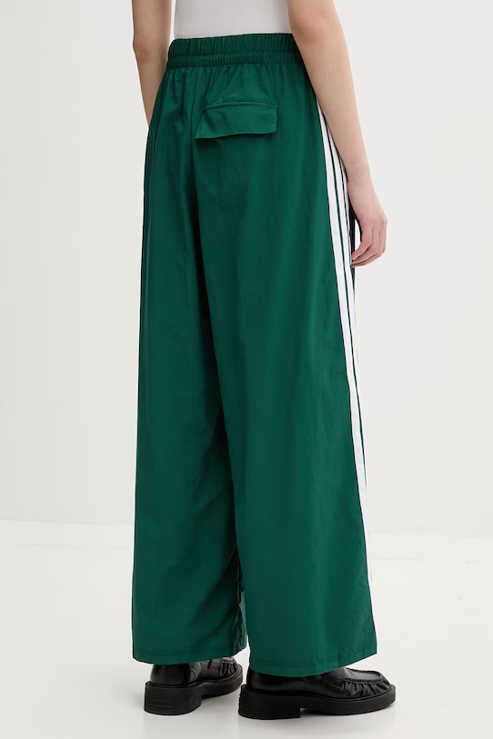 Odzież Adidas spodnie dresowe damskie KD9451 zielony