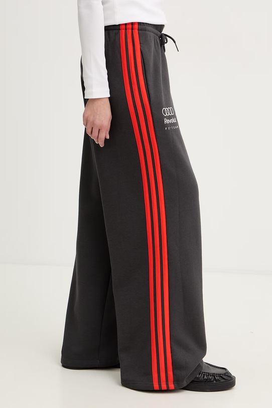 Odzież Adidas spodnie dresowe damskie x Audi KE8347 szary