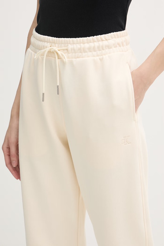 Calvin Klein Jeans spodnie dresowe damskie bawełniane beżowy LV047F210G
