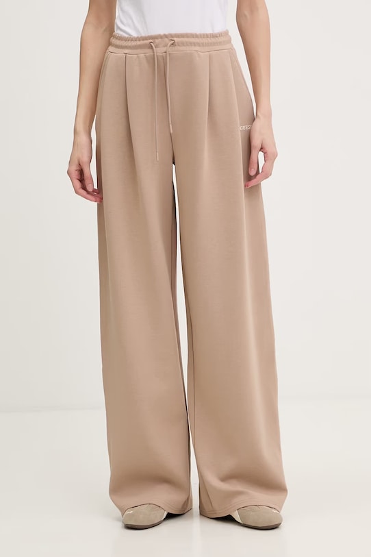 Guess spodnie dresowe damskie JASMINE beżowy V6GB01.K2914
