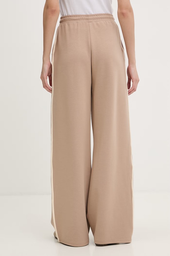 Odzież Guess spodnie dresowe damskie JASMINE V6GB01.K2914 beżowy