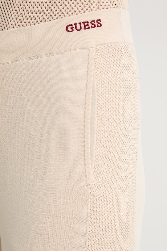 Guess spodnie dresowe damskie GABRY beżowy V6GB06.Z0651