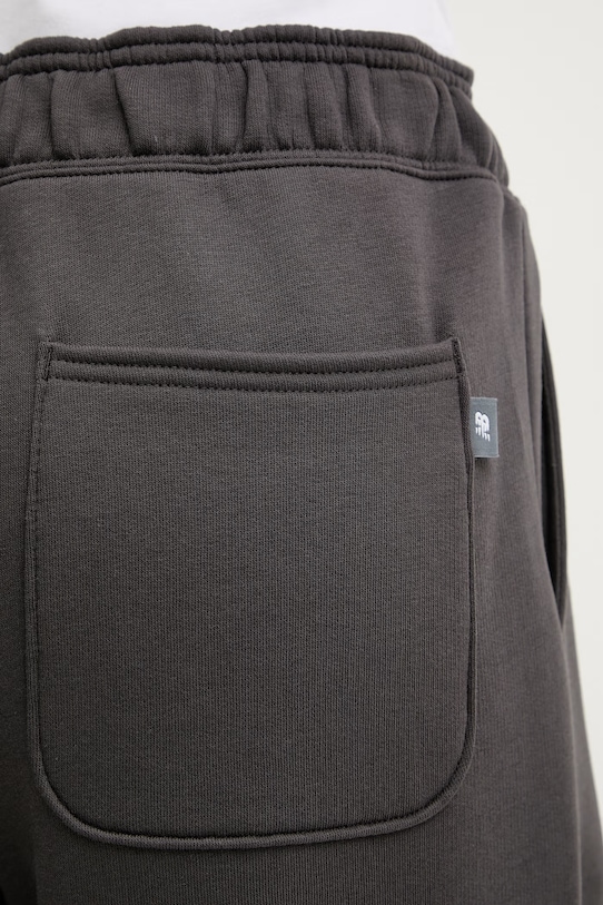 New Balance spodnie dresowe damskie Fleece szary WB61W1DZABR