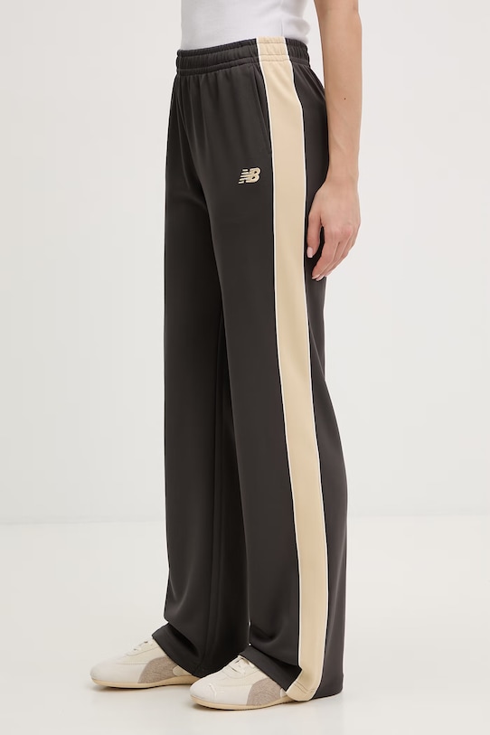 New Balance spodnie dresowe damskie Interlock szary WB61Q2R4ABR