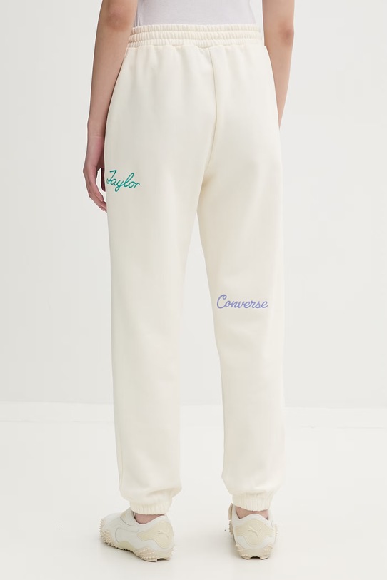Odzież Converse spodnie dresowe damskie CVW6B094 beżowy