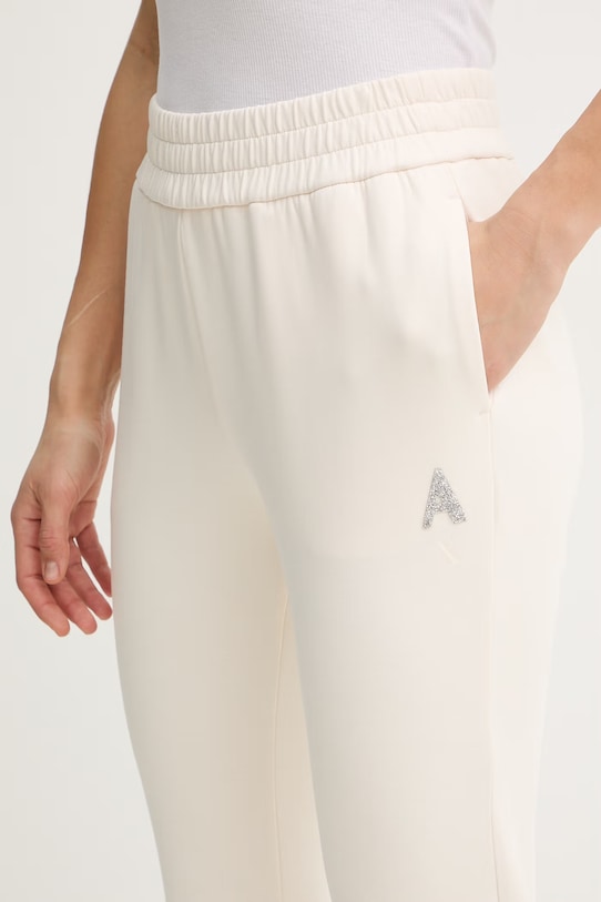 Armani Exchange spodnie dresowe beżowy XW002210.AF21298