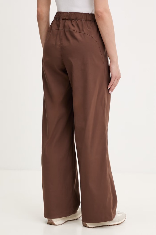 Odzież Under Armour spodnie dresowe damskie Unstoppable Wvn 6014752 brązowy