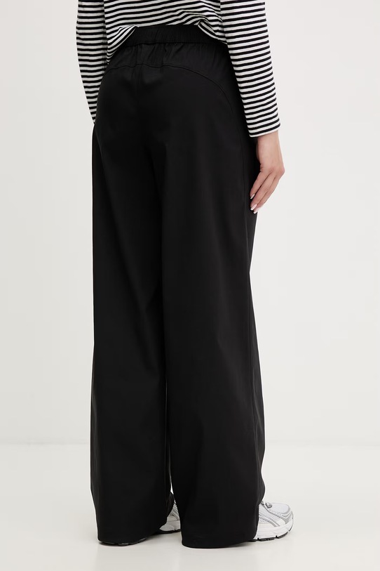 Odzież Under Armour spodnie dresowe damskie Unstoppable Wvn 6014752 czarny