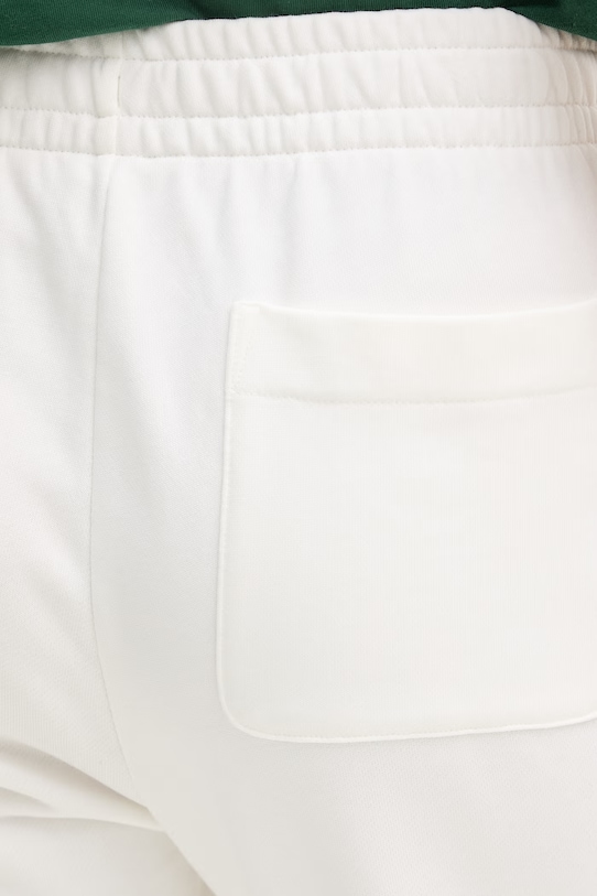 Lacoste spodnie dresowe damskie beżowy XF7604