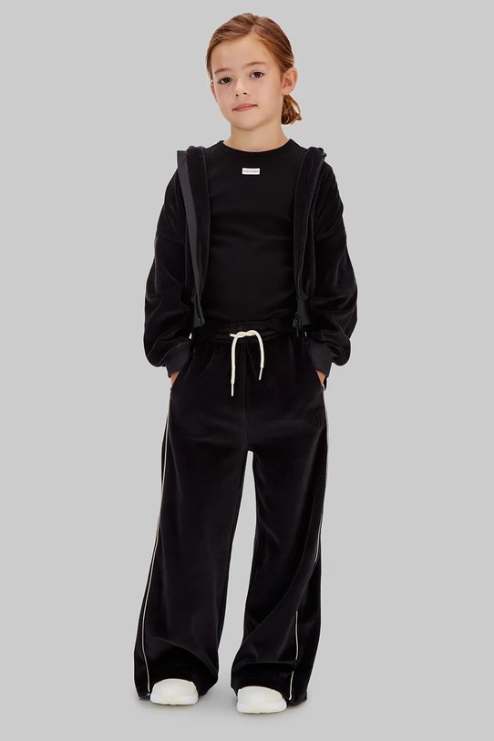 Calvin Klein Jeans spodnie dresowe welurowe dziecięce dzianina czarny IG0IG03057.128.176.PPY2