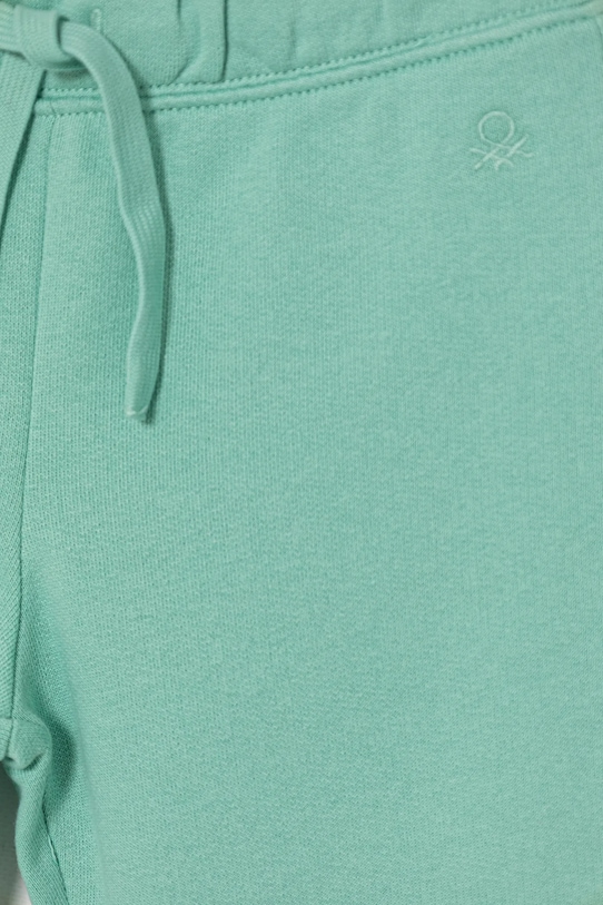Dziewczynka United Colors of Benetton spodnie dresowe bawełniane dziecięce 3J68CF02H.G.Stagionale turkusowy