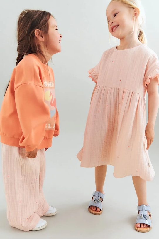 Wheat spodnie bawełniane dziecięce 2706.240.GOTS pomarańczowy