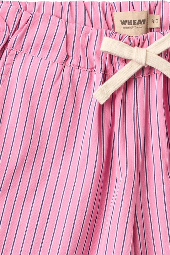 Wheat spodnie bawełniane dziecięce różowy 2706.415.GOTS