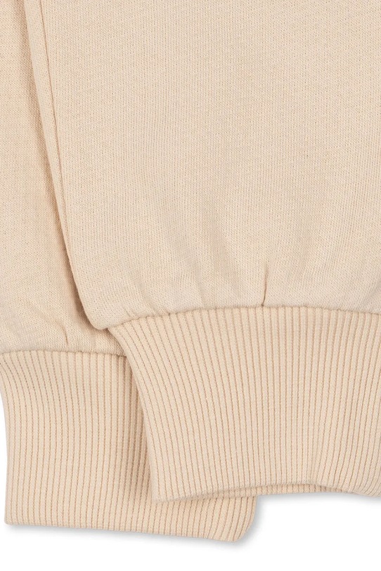 Konges Sløjd spodnie dresowe bawełniane dziecięce LOUPY LOU SWEAT PANTS OCS beżowy KS104349.PreSpring