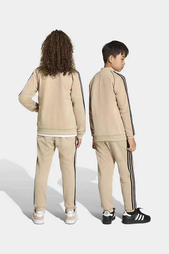 Chłopiec adidas Originals spodnie dresowe dziecięce KE2864 beżowy