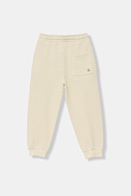 United Colors of Benetton spodnie dresowe dziecięce bawełniane 30DSCF06W.G.Stagionale beżowy SS26