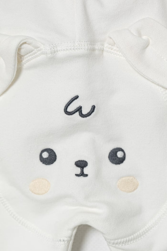 Chłopiec United Colors of Benetton spodnie dresowe dziecięce bawełniane z elastanem 35FNAF029.W.Stagionale biały