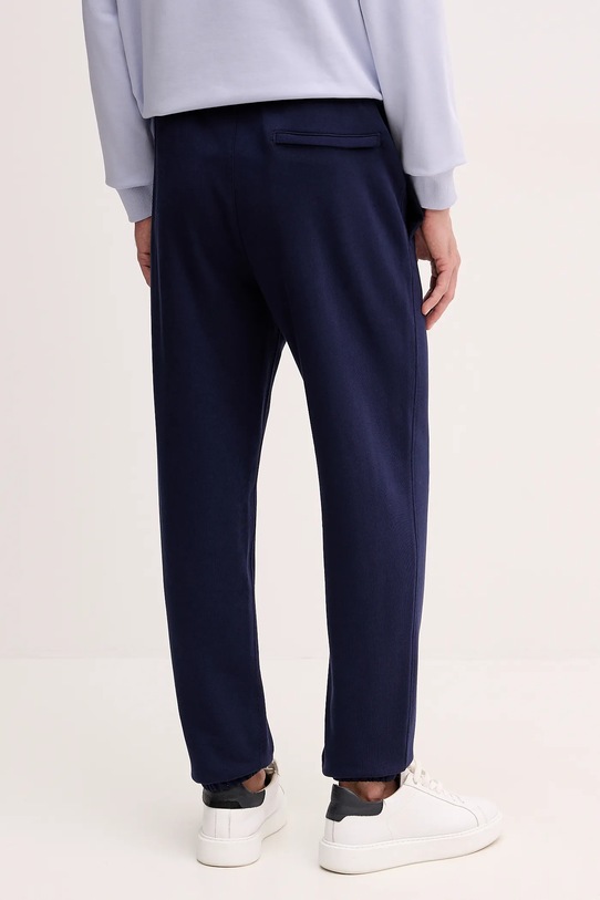 Odzież Calvin Klein Jeans spodnie dresowe bawełniane LV04RE256G granatowy