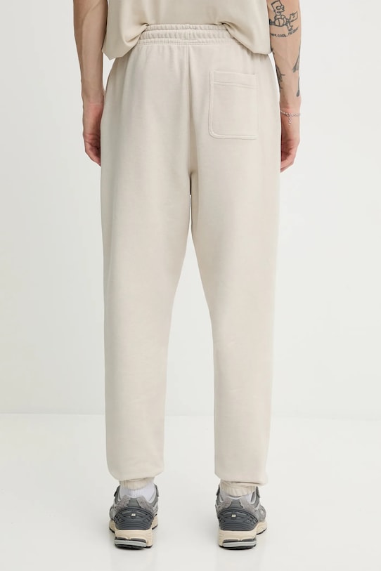 Odzież Tommy Jeans spodnie dresowe DM0DM22358 beżowy