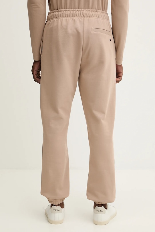 Tommy Hilfiger spodnie dresowe bawełniane MW0MW42537 beżowy SS26