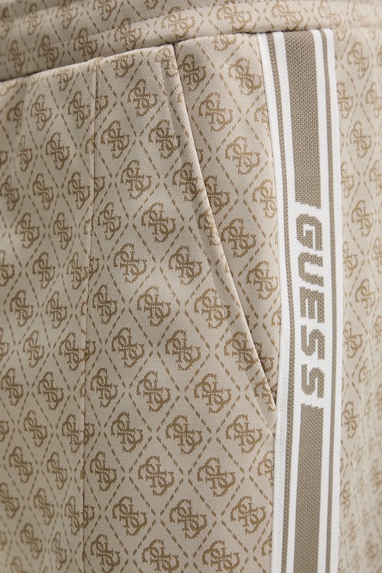 Guess spodnie dresowe PARIMO beżowy Z5BB07.K2042