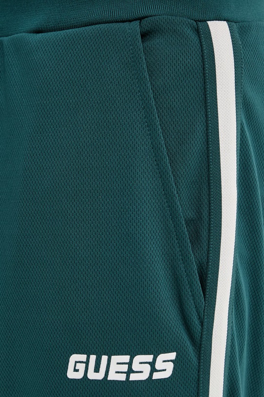 Guess spodnie dresowe LANSA turkusowy Z6RB13.KD482
