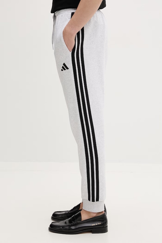 adidas teplákové nohavice pánske s bavlnou Essentials sivá JD1858