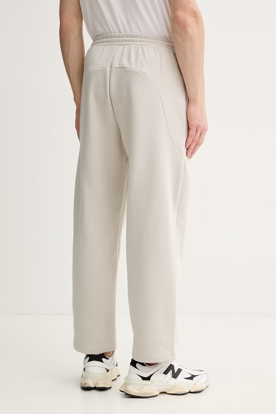 Odzież adidas spodnie dresowe Collegiate JZ0165 beżowy