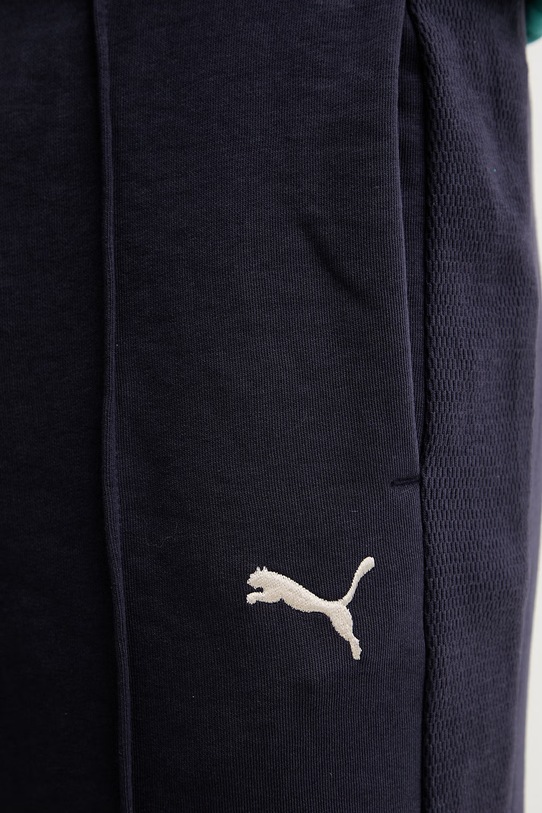 Puma spodnie dresowe Class relax granatowy 692072