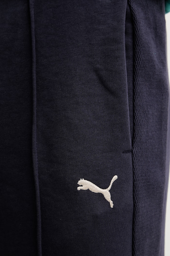 Puma spodnie dresowe Class relax granatowy 692072