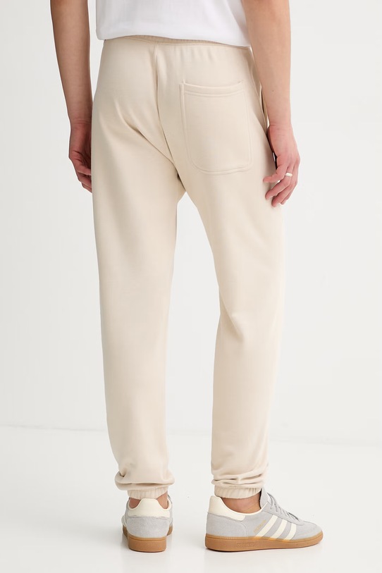 Odzież adidas spodnie dresowe KC3173 beżowy