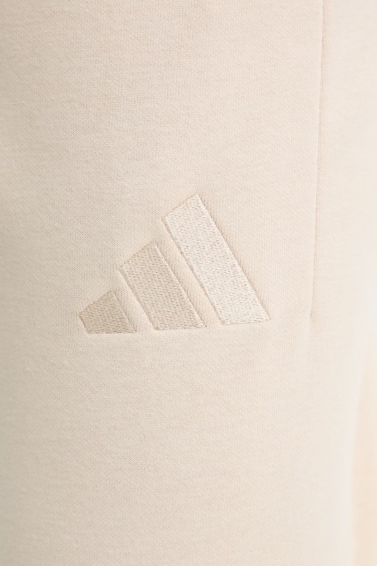adidas spodnie dresowe beżowy KC3173