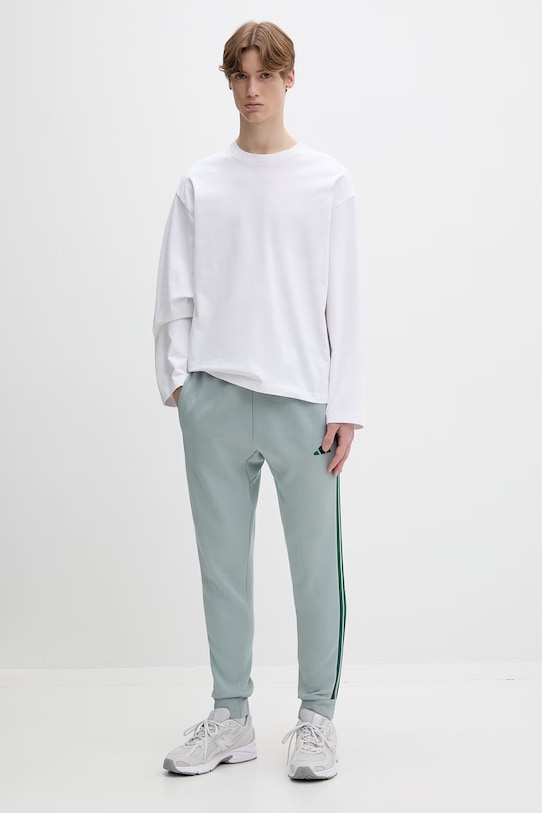 adidas spodnie dresowe KD4836 turkusowy SS26