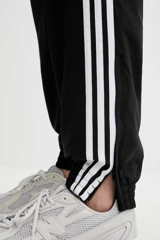 Tepláky adidas Originals Firebird čierna KE1371