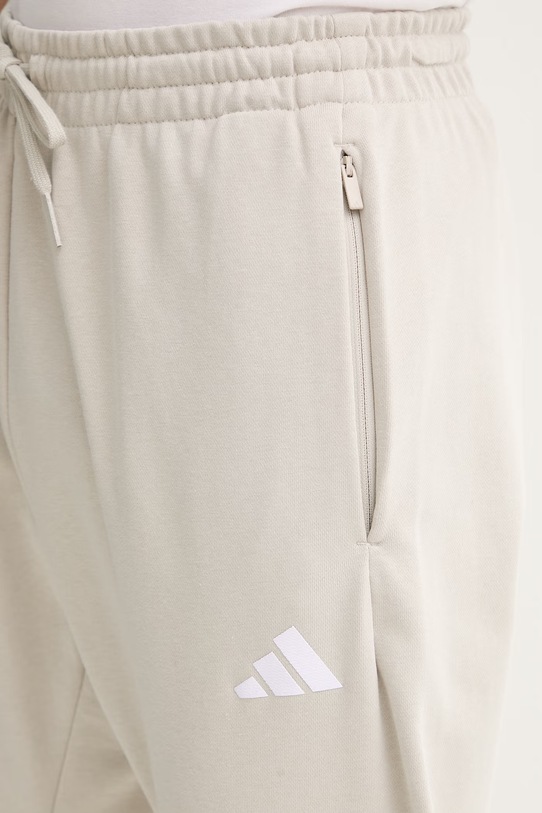 adidas spodnie dresowe beżowy KS3020