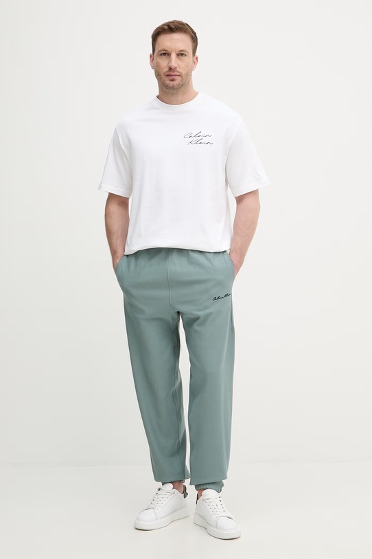 Calvin Klein Jeans teplákové nohavice pánske LV04RF249G zelená SS26