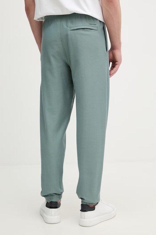 Oblečenie Calvin Klein Jeans teplákové nohavice pánske LV04RF249G zelená