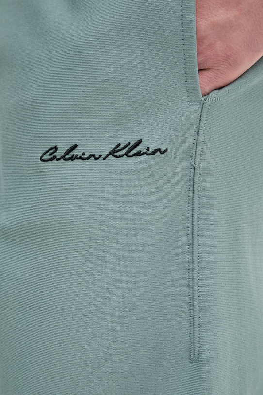 Calvin Klein Jeans teplákové nohavice pánske zelená LV04RF249G