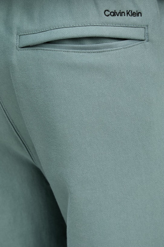 Calvin Klein Jeans teplákové nohavice pánske LV04RF249G zelená