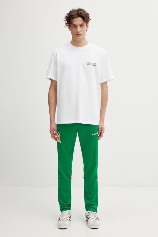 adidas Performance spodnie dresowe męskie FMF TP 86 zielony JX4102