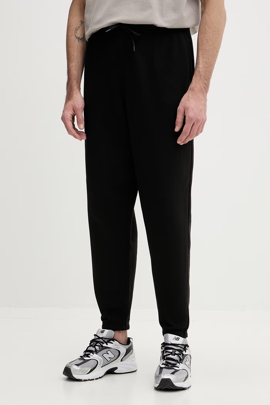 Tommy Jeans spodnie dresowe męskie z bawełny czarny DM0DM23014