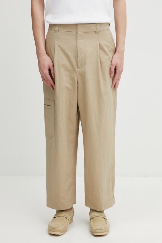 Maison Kitsuné spodnie męskie beżowy QM01106WW9082