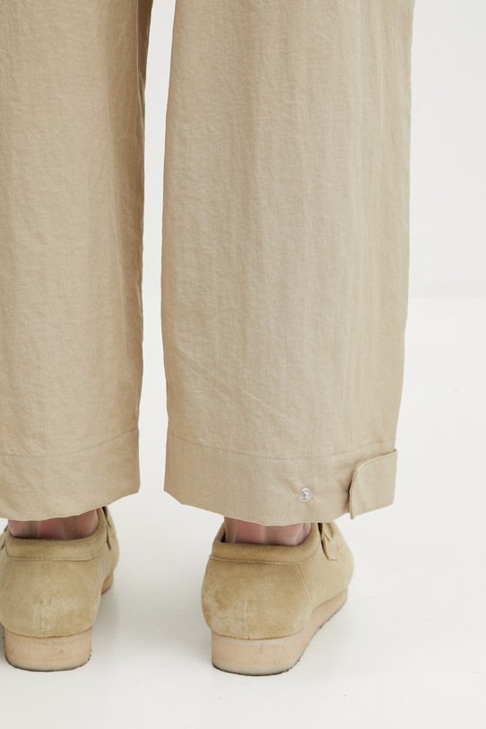 Maison Kitsuné spodnie męskie beżowy QM01106WW9082