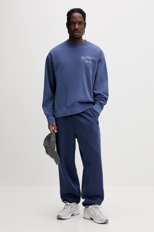 Vans spodnie dresowe męskie bawełniane Premium LX Fleece VN000T7FFOB1 niebieski SS26