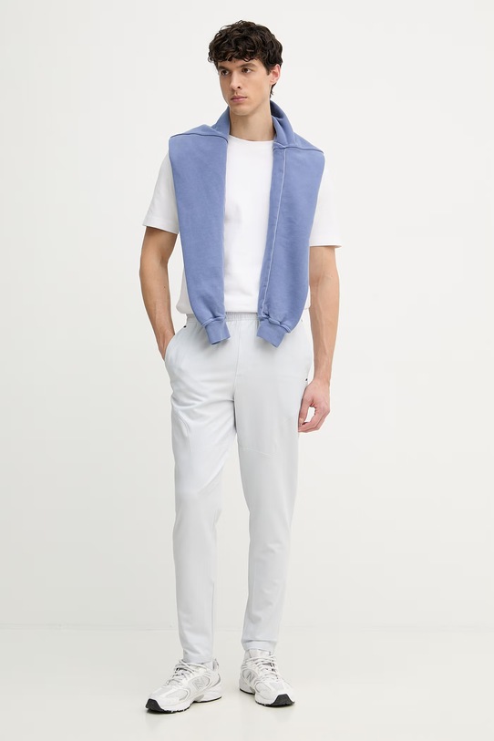 Under Armour spodnie joggery męskie Unstoppable 6003861 szary SS26