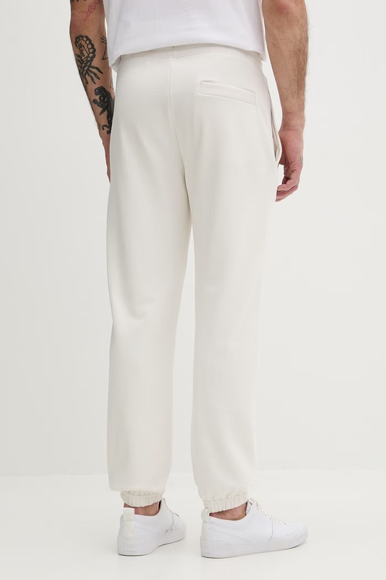 Odzież HUGO spodnie dresowe bawełniane Daylony 50557453 beżowy