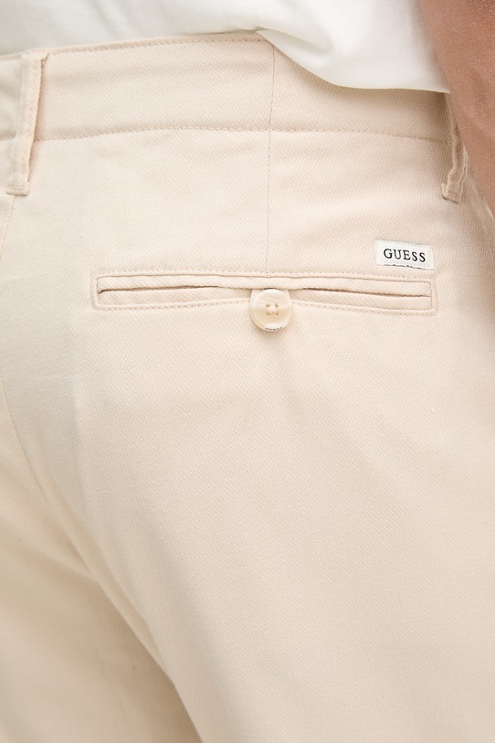 Guess spodnie męskie z bawełną PAOLO beżowy M6GB14.W2023